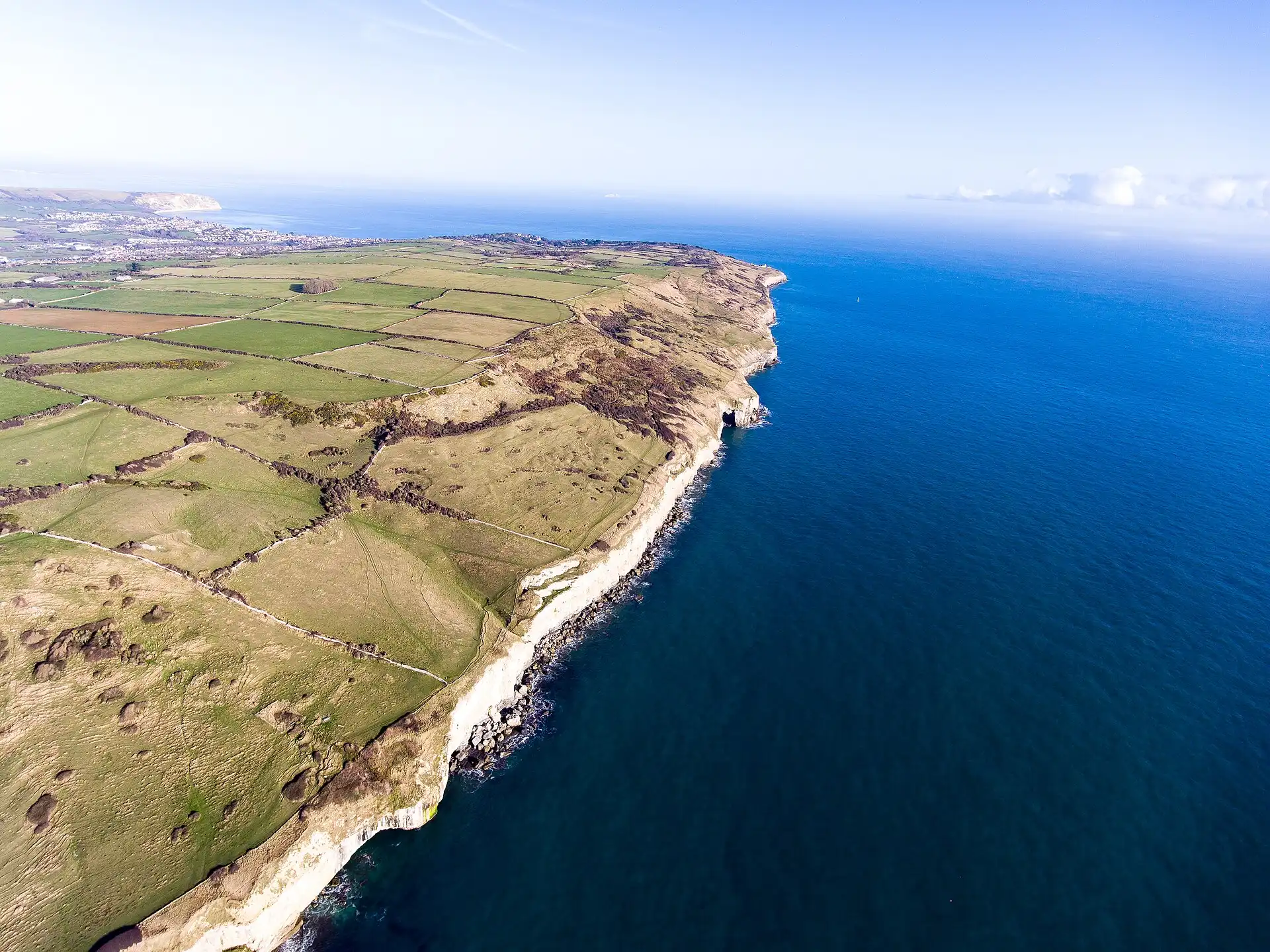 Chalk cliffs and fields at Swanage, on the Dorset coast.
